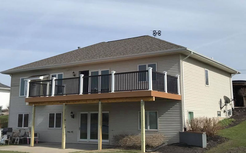 Deck and patio with railing