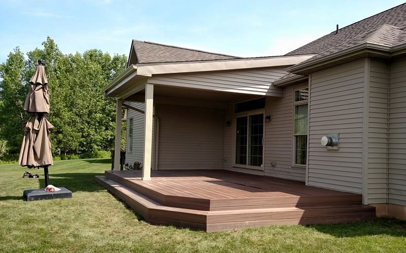 Wooden deck with step down to yard