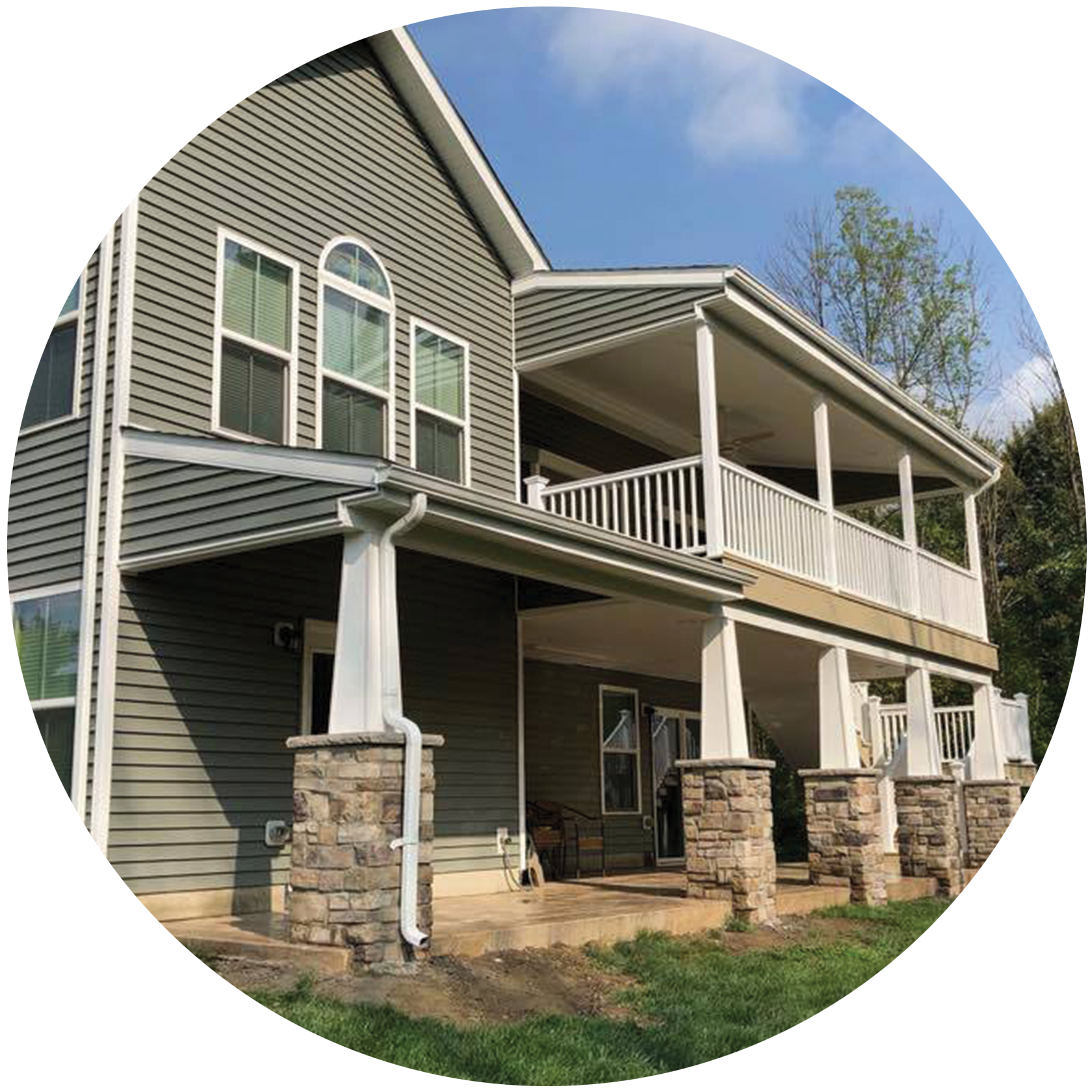 Roof and two-story porch with concrete patio